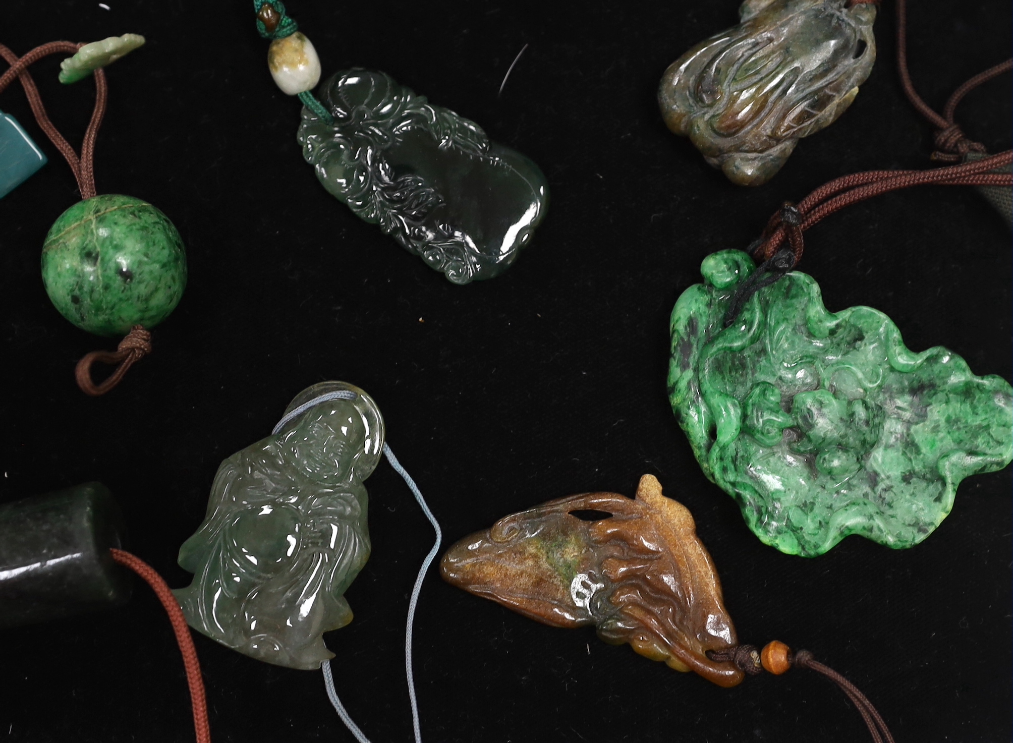 Fourteen Chinese jadeite carvings, largest 6.8cm